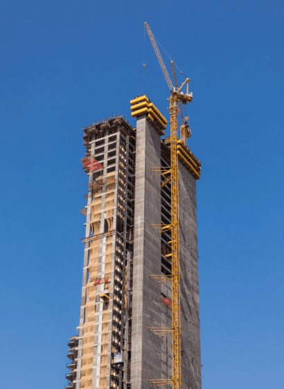 Owner reviewing construction plans and budget