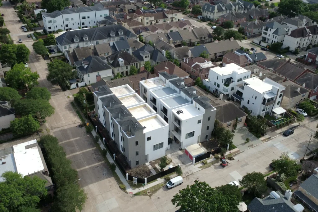 Aerial view of a completed urban townhome development